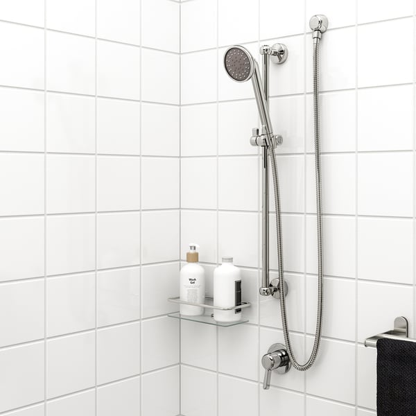 A VOXNAN shower set with chrome hand shower and flexible rail.