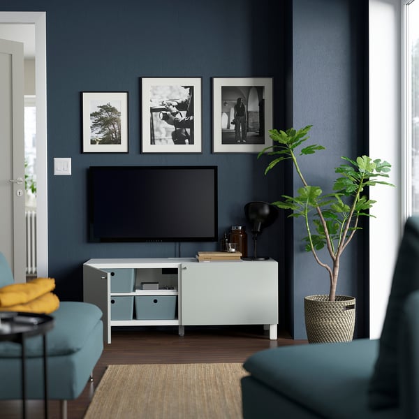 Modern living room with BESTÅ tv unit, soft-close doors, and decor.