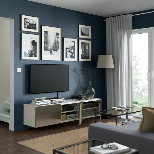 Modern living room with BESTÅ tv bench, featuring adjustable shelves, cable management, and wall-mounted design for a clean, organized space.