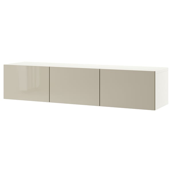White & beige BESTÅ tv bench, sleek rectangular design, adjustable shelves, soft-closing doors, airy look.