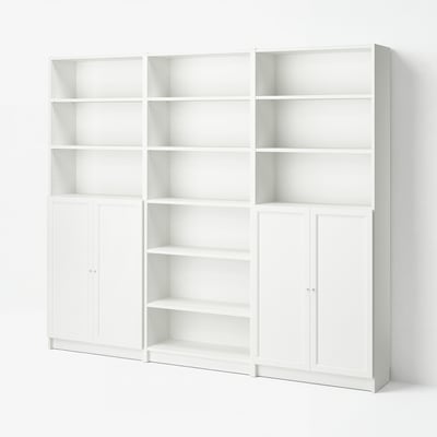 White BILLY storage system with open and closed shelves in simple design.
