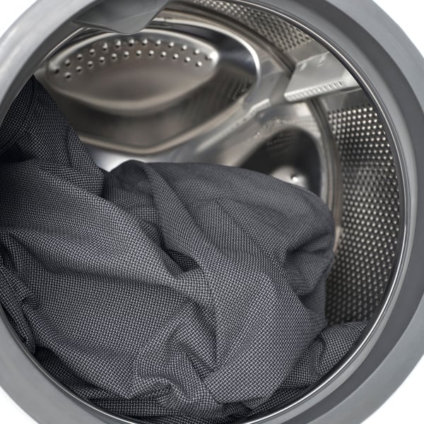 Image shows bed frame with washable covers, debated for cleanliness.