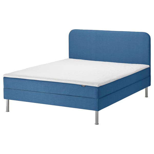 Blue BLÅFJÄLLET bed with white mattress, padded headboard, and metal legs.