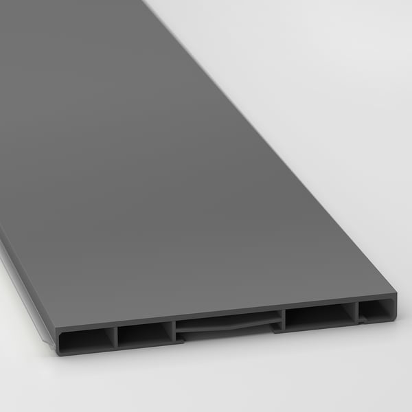 Dark grey plastic kitchen cabinet plinth, showcasing smooth surface and sturdy build, ideal for covering floor gaps.