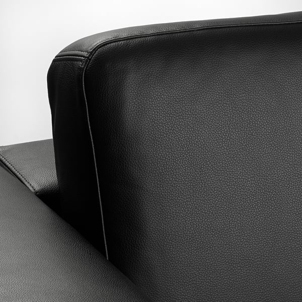 Black leather sofa section, showcasing smooth, high-quality grain leather, supportive cushions, and sleek design.