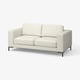 White leather sofa, modern design, clean lines, two cushions, black metal legs.