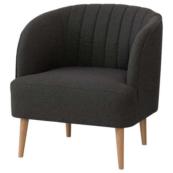 Dark grey fullosa barrel chair with wooden legs, back tufting, supportive ergonomic shape.