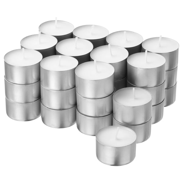 White GLIMMA candles in pyramid set with plant wax.