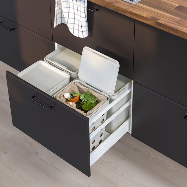 Kitchen recycling bin set, black and white, integrated under sink, lidded bins for waste sorting.