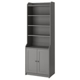 A grey HAUGA storage cabinet with an open top and two closed doors, ideal for versatile home use with a traditional design.