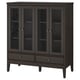 A black IDANÄS display cabinet with glass doors, offering modern and elegant design for home storage.