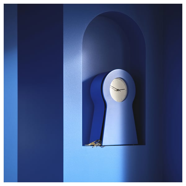 Blue, unique-shaped wall clock with keyhole design, no hands, silent, IKEA PS 1995.