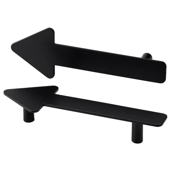 Two black arrow-shaped drawer handles, one horizontal, one vertical. Steel, modern minimalist design.