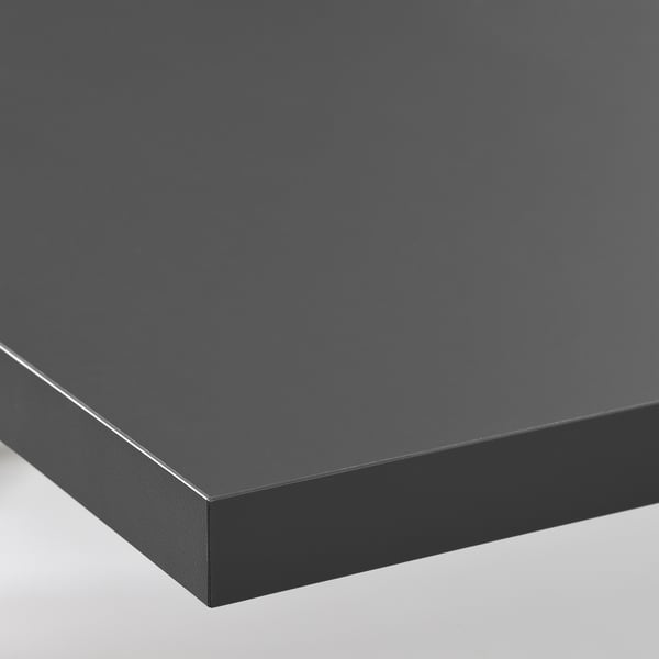 Black rectangular worktop with smooth surface and straight edges, showcasing high-quality and modern design.