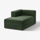 A modern, dark green, l-shaped sectional sofa with clean lines and minimalist design. It has thick cushions and a storage ottoman.