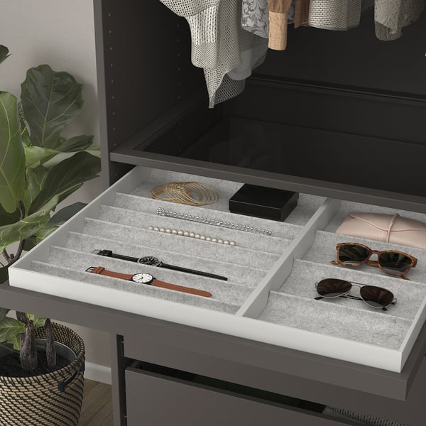 Open drawer tray with jewellery and accessories. Includes compartments, felt liner, and slow-closing mechanism.