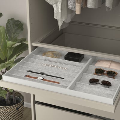 Grey tray drawer organises jewellery and accessories with smooth pull-out.