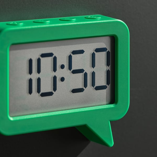 Green digital clock displaying 10:51. Modern design with clear, large numerals. Attaches to metal surfaces via magnet.