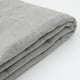Close-up of soft, folded grey fabric, showcasing premium texture and quality.
