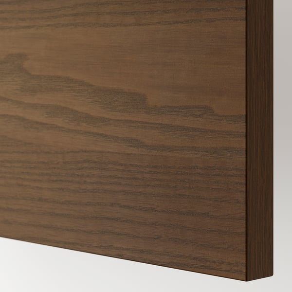 Dark wood close-up, smooth texture, rich grain pattern.
