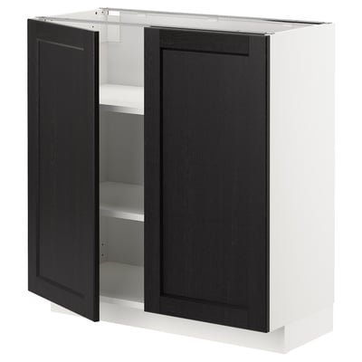 An open dark grey wooden kitchen cabinet from ikeas METOD series, featuring two doors and an adjustable shelf inside.