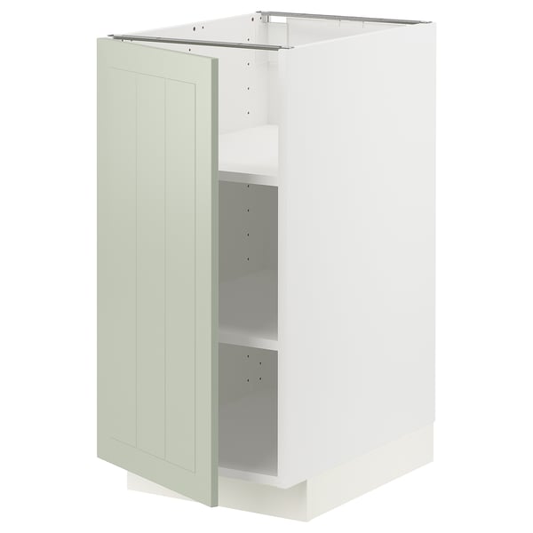A white METOD kitchen cabinet with a green stensund door, rectangular with a flat surface and panel design.