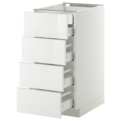 A white, modern METOD kitchen cabinet with four smooth, white drawers. Its sleek and functional for storage.