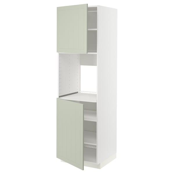 A METOD kitchen cabinet with stensund green doors, showcasing a vertical design with adjustable shelves and a 25-year guarantee.
