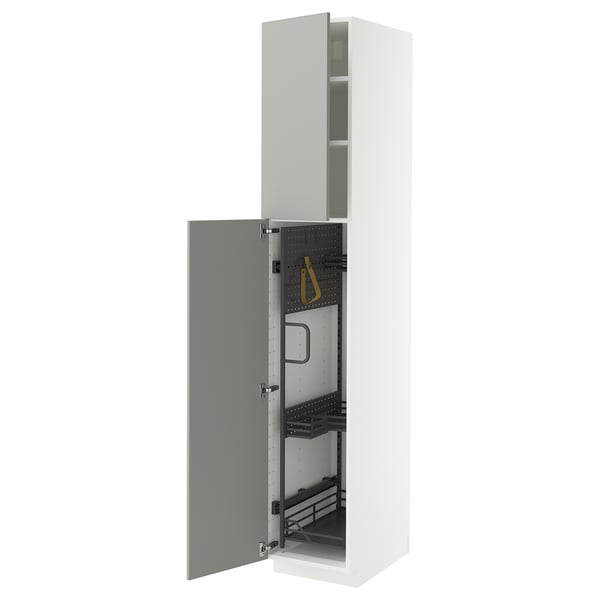 An open white METOD kitchen cabinet with green doors and metal organizers.