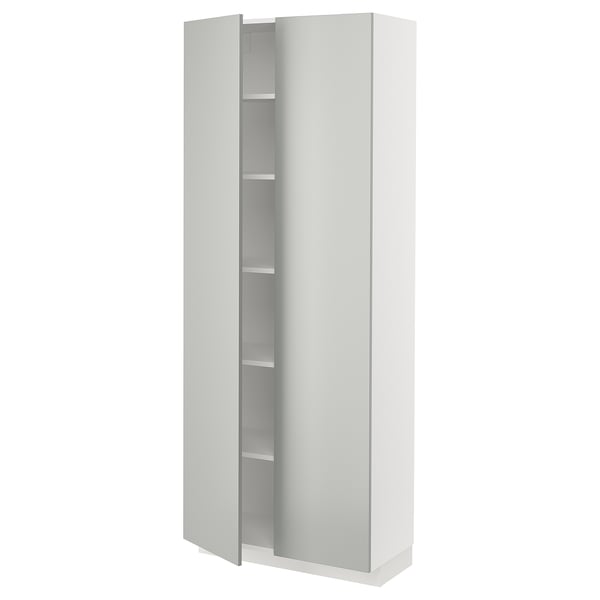 A modern, white ikea METOD kitchen cabinet with light grey doors, sleek design, and clean lines.