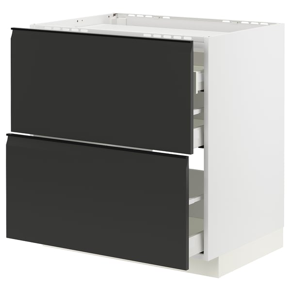 METOD kitchen unit: modern black drawers, two high, white sides, sleek handle-less design.