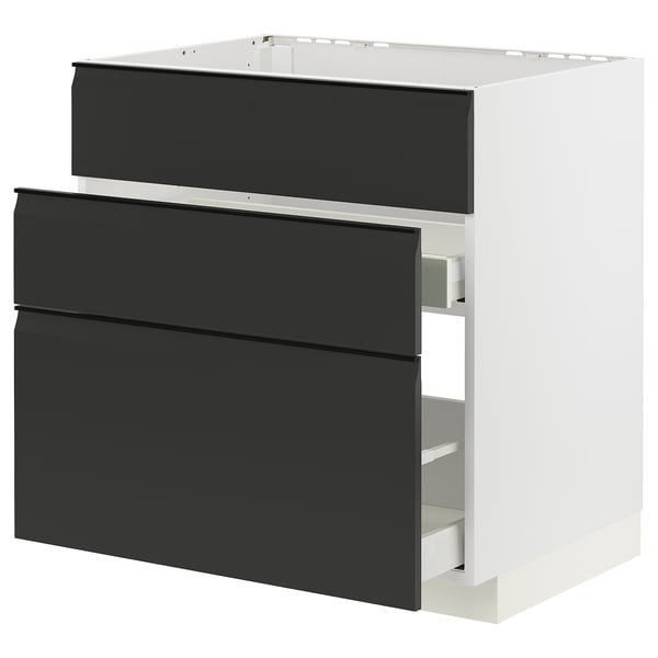 Modern black and white kitchen cabinet set with integrated handles and smooth drawers.