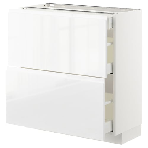 White high-gloss modern kitchen cabinet with integrated handles and soft-close drawers.