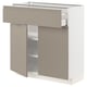 Modern kitchen cabinet in matte grey-beige with integrated handles and adjustable shelves.