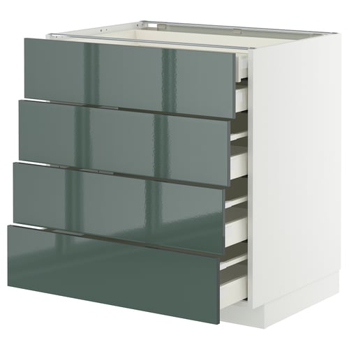 A METOD kitchen unit with four grey-green glossy drawers and a white frame, designed for modern kitchens.