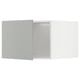Modern white fridge-freezer combo from IKEAs METOD series, featuring sleek design and light grey havstorp fronts, including handle and hinge details.