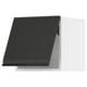 Black modern kitchen cabinet with sleek, angular design. Part of the METOD system, featuring matte black integrated handle.