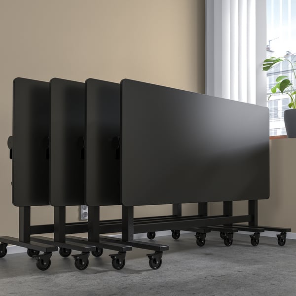 MITTZON foldable tables on wheels for flexible meeting spaces.