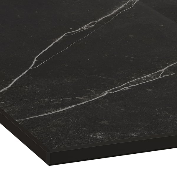 Black high-pressure porcelain worktop with subtle veins, smooth edge, and glossy finish.
