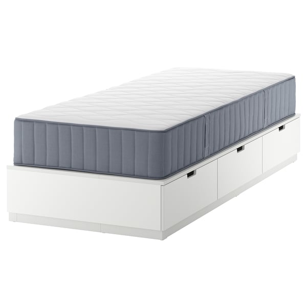 NORDLI white bed with blue mattress, modern design, three storage drawers.