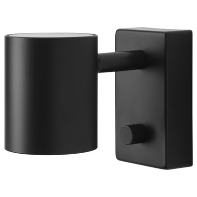 Black NYMÅNE wall lamp with adjustable round shade, matte finish.