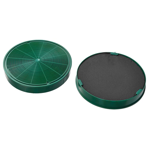 Two green round charcoal philtres. One is open with structures, the other covered in mesh.