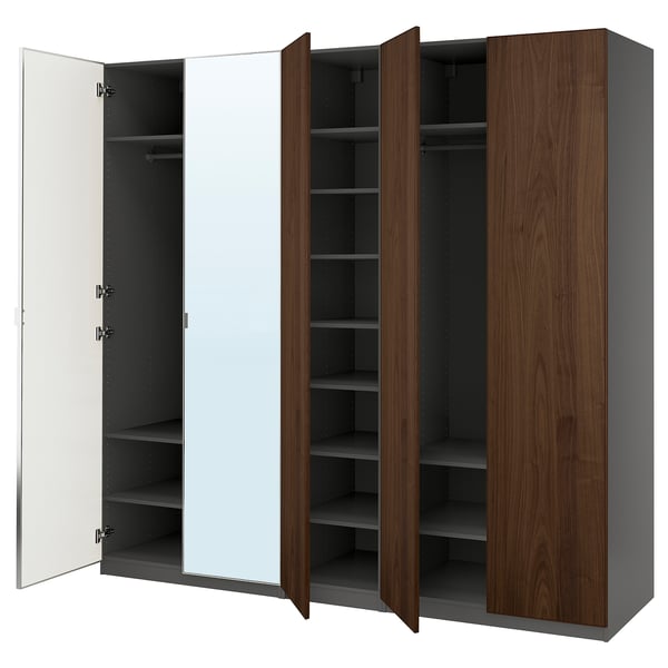 PAX wardrobe: three open sections - left mirrored, middle wooden, right wooden. Tall, dark brown, rectangular, modern design.
