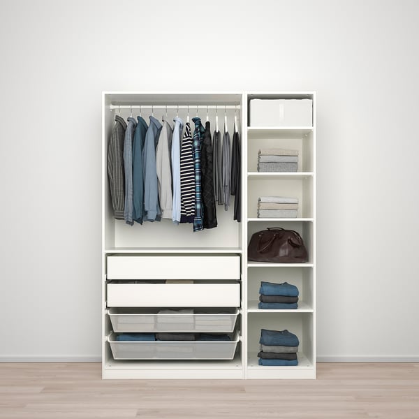 A white wardrobe with hanging shirts, folded clothes, and shelves with accessories, showcasing organised storage solutions.