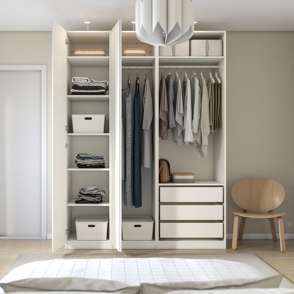 Closed wardrobe unit with clothes and shelves, beside an open wardrobe with hangers and folded clothes.
