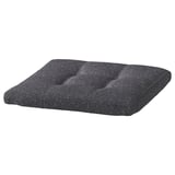 Dark grey POÄNG cushioned footstool with tufted design, recycled fabric.