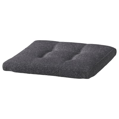 Dark grey POÄNG cushioned footstool with tufted design, recycled fabric.