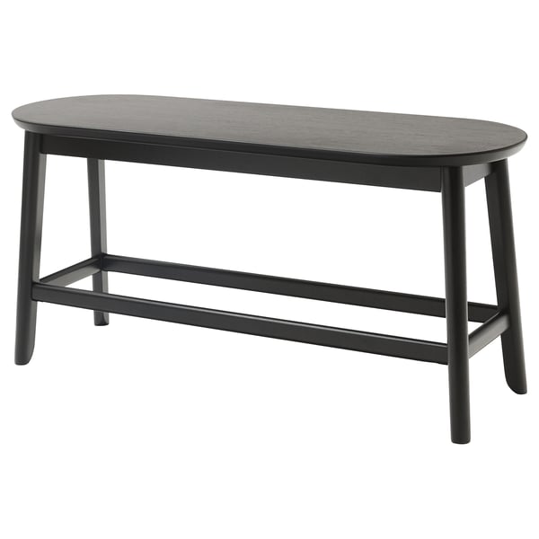 Black oval coffee table, RÄVSTEN, sleek minimalist design, four angled legs, dark wood finish.