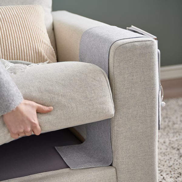 Grey SILÄNG armrest pocket organises items, made from recycled polyester.