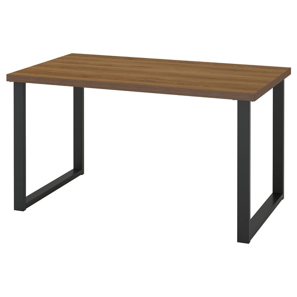 The SKÅLSTA table with a wooden top and metal legs. Rectangular, it has a sleek honeycomb structure for support. Ideal for modern spaces.